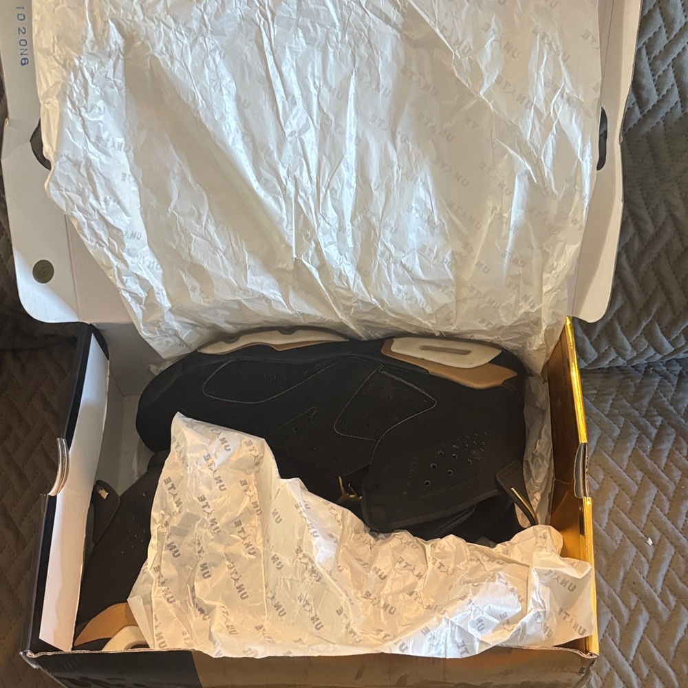 Jordan Black and Gold Sneakers
